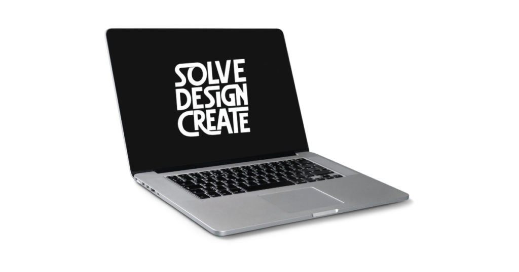 A laptop displaying the text 'SOLVE DESIGN CREATE' on a black screen.