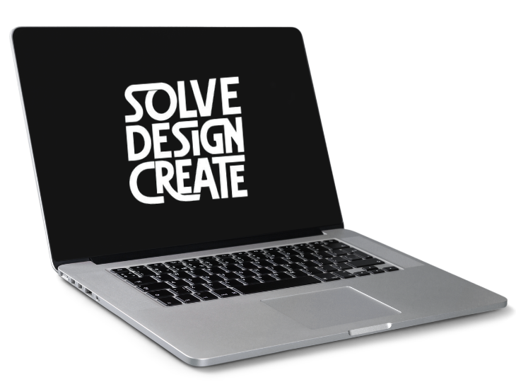 A laptop displaying the text 'SOLVE DESIGN CREATE' on a black screen.