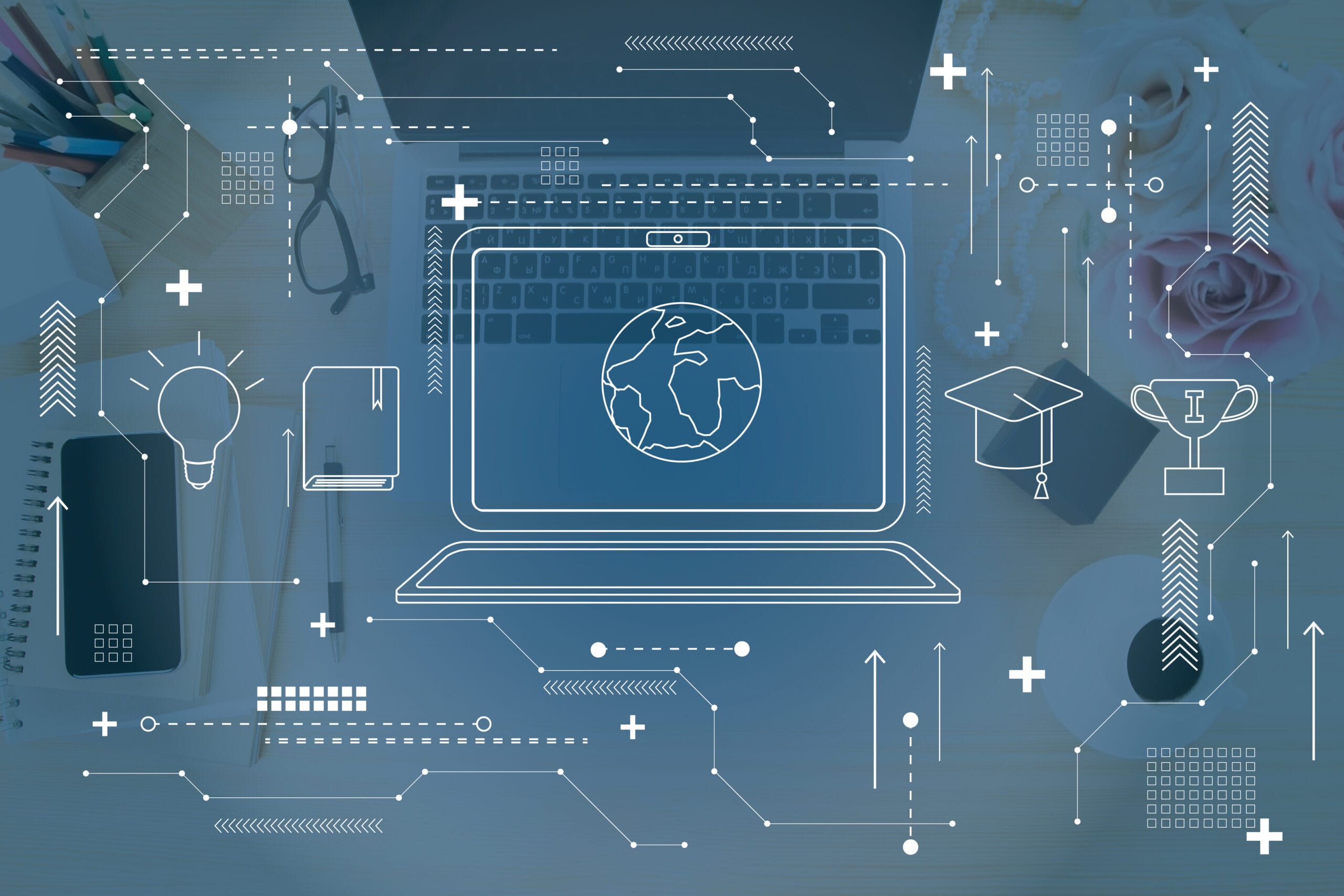A laptop displaying a globe, surrounded by digital icons representing education and innovation.