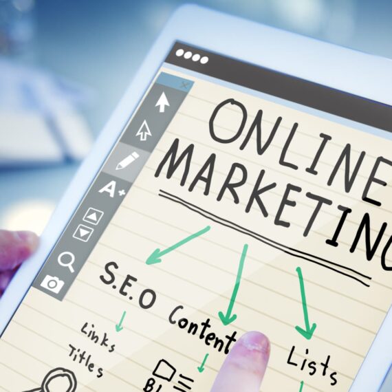 A tablet displaying notes on online marketing strategies and SEO content.