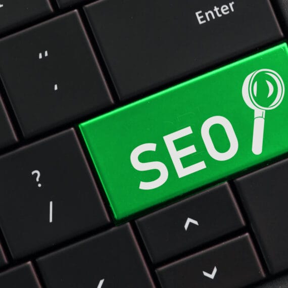 Image showing a skilled digital marketing professional optimizing a Naples business's online presence through SEO and GEO strategies.