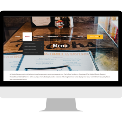 A computer screen displaying a restaurant website menu interface.