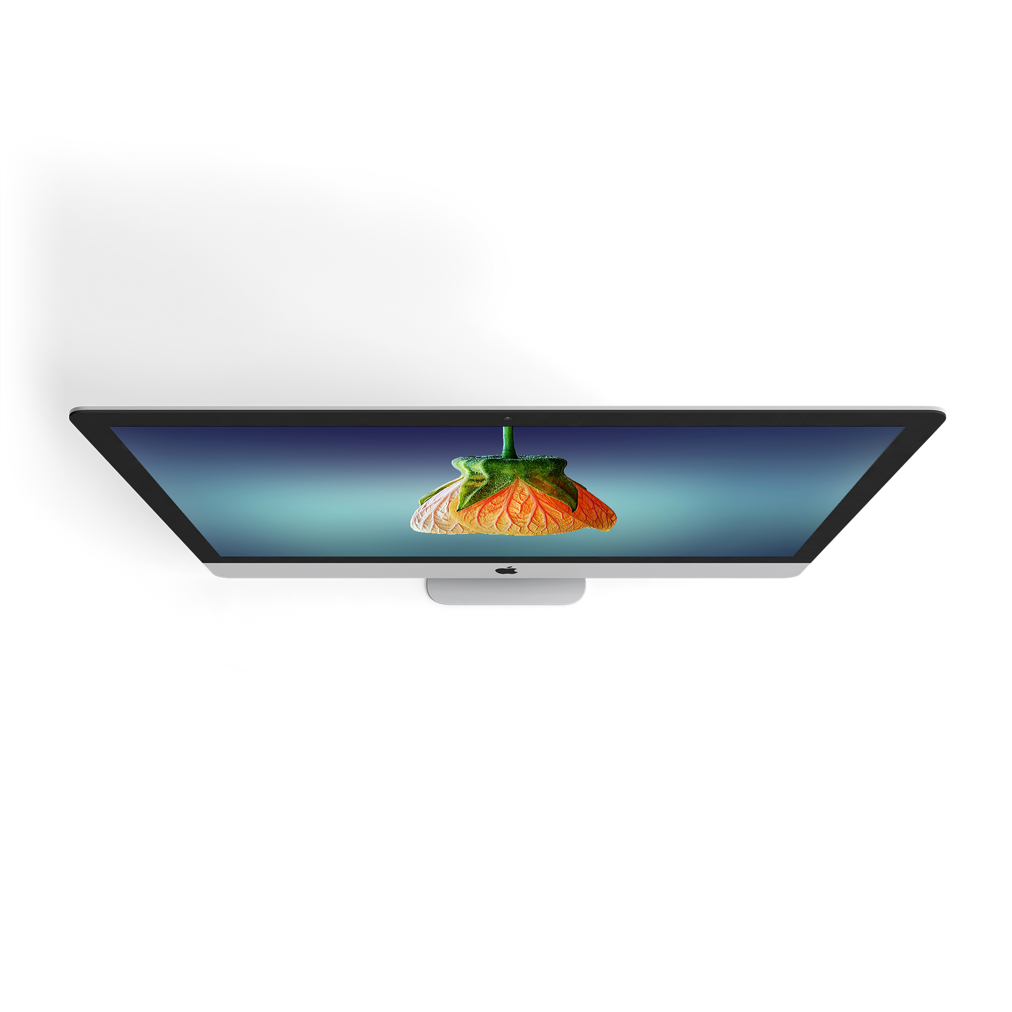 A sleek Apple computer displaying a vibrant image of a fruit against a gradient background.